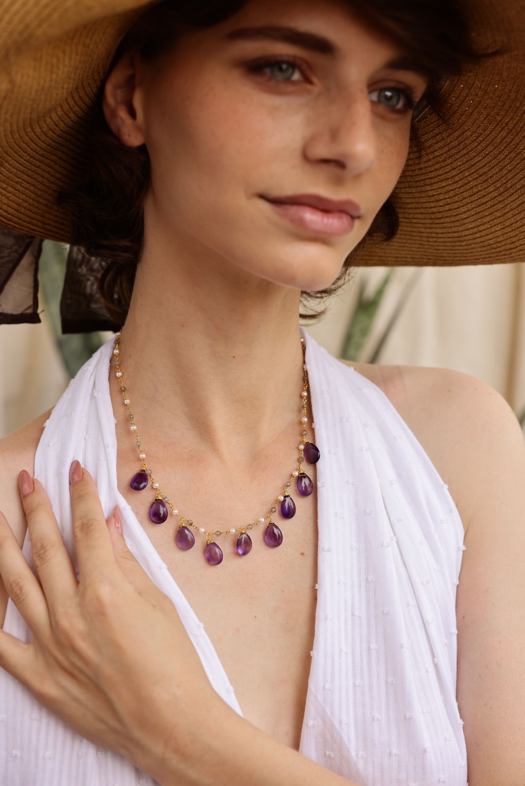 Raindrops necklace in 92. 5 Sterling Silver with Amethyst strung with Labradorite and Pearls in 1 micron Gold plating.
Length- 16-18 inches adjustable.