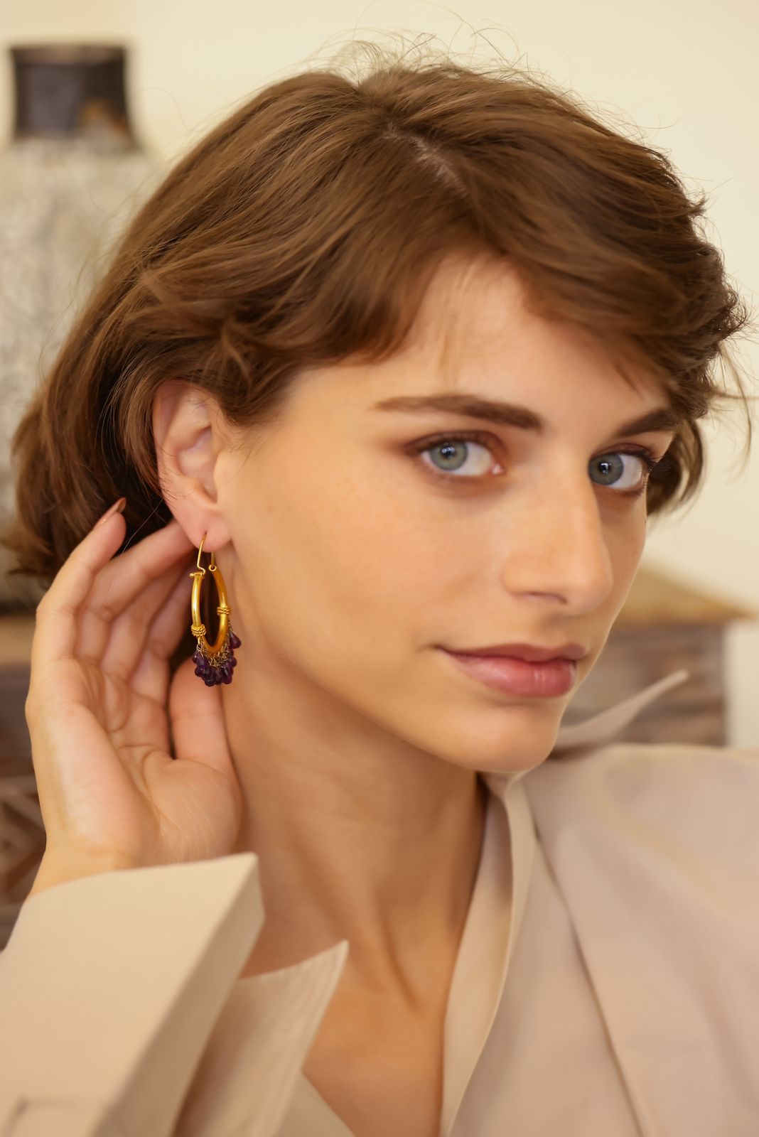 Purple hoops in 92.5 Sterling Silver with faceted Amethyst drops dipped in
1 micron gold plating.