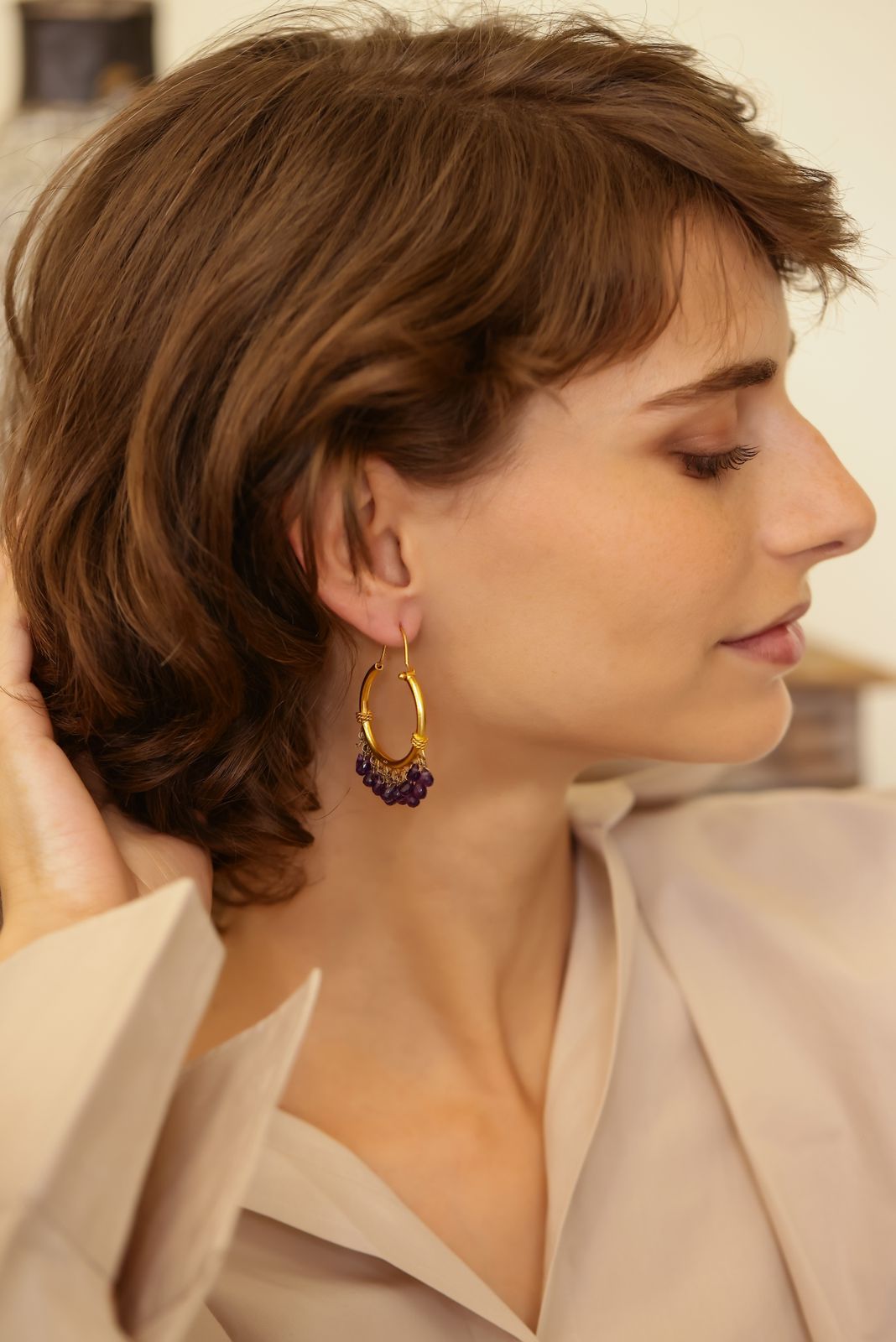 Purple hoops in 92.5 Sterling Silver with faceted Amethyst drops dipped in
1 micron gold plating.