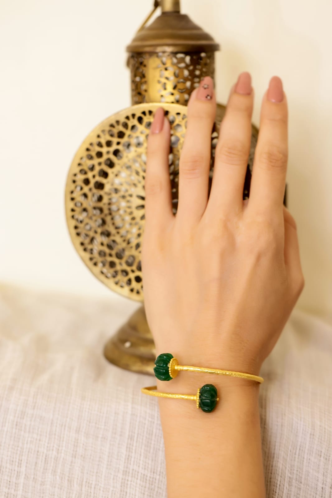 Anandi Bracelet in 92.5 Sterling Silver dipped in 1 micron Gold plated with
Green Onyx carved stones.