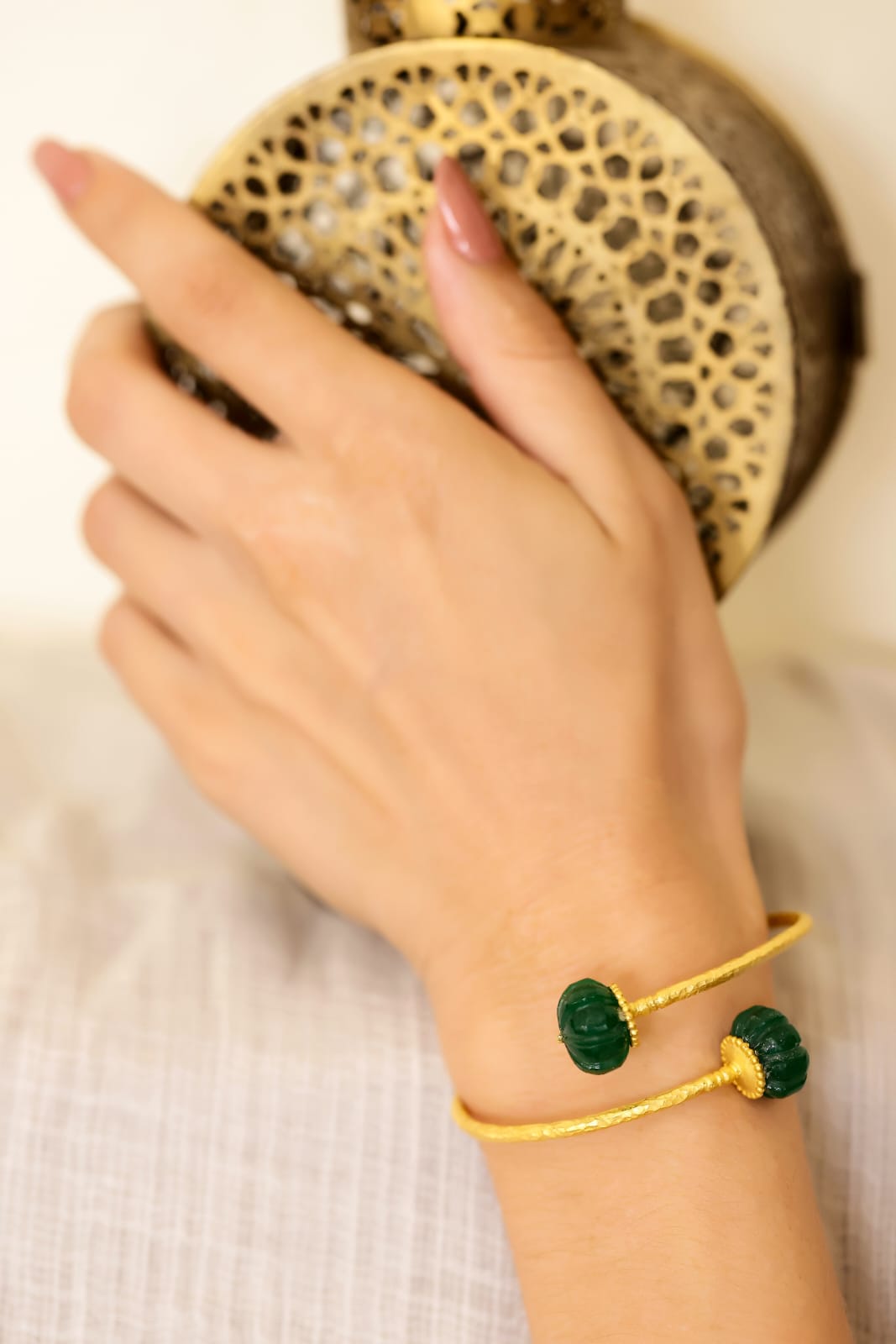 Anandi Bracelet in 92.5 Sterling Silver dipped in 1 micron Gold plated with
Green Onyx carved stones.