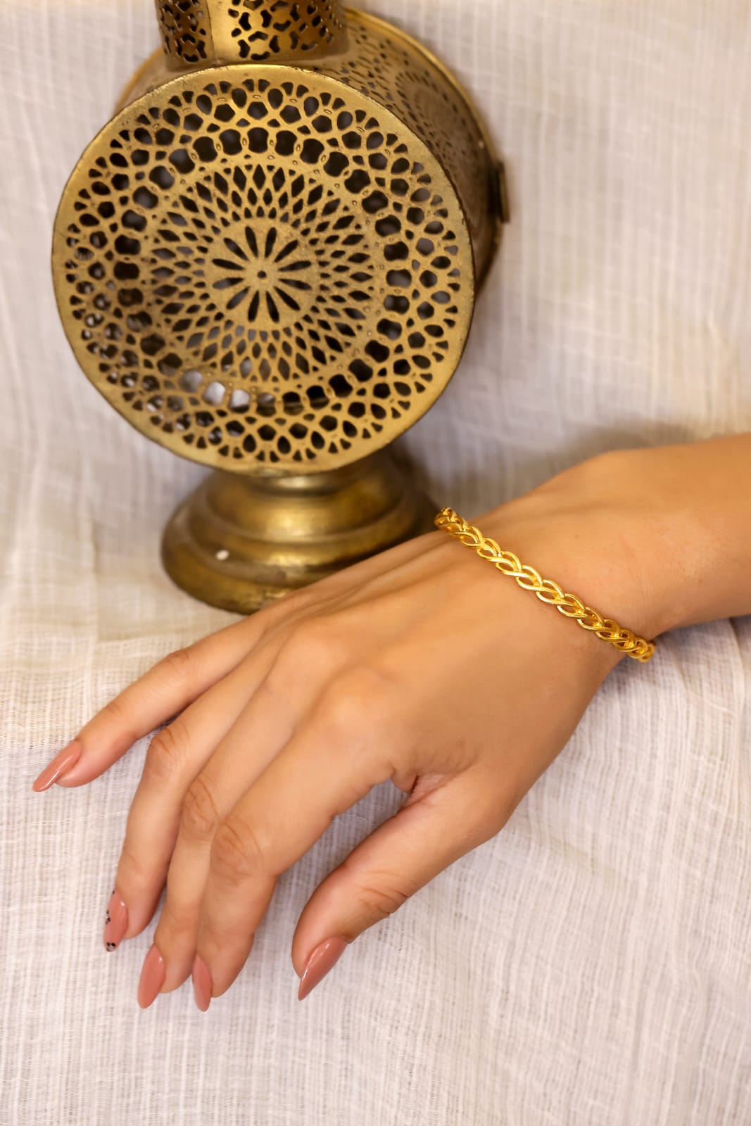 Handcrafted silver hand knotted cable bracelet in 92.5 sterling Silver with 1 micron gold plating, size adjustable.