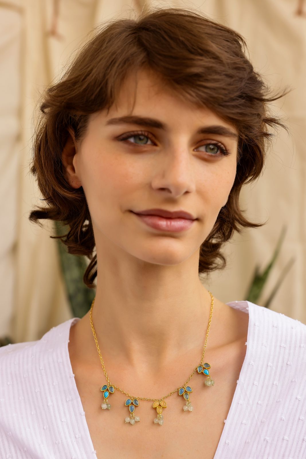 Kusum necklace in 92.5 Sterling Silver, dipped in 1 micron Gold plating with semi precious stones, and Turquoise with yellow Aventurine.