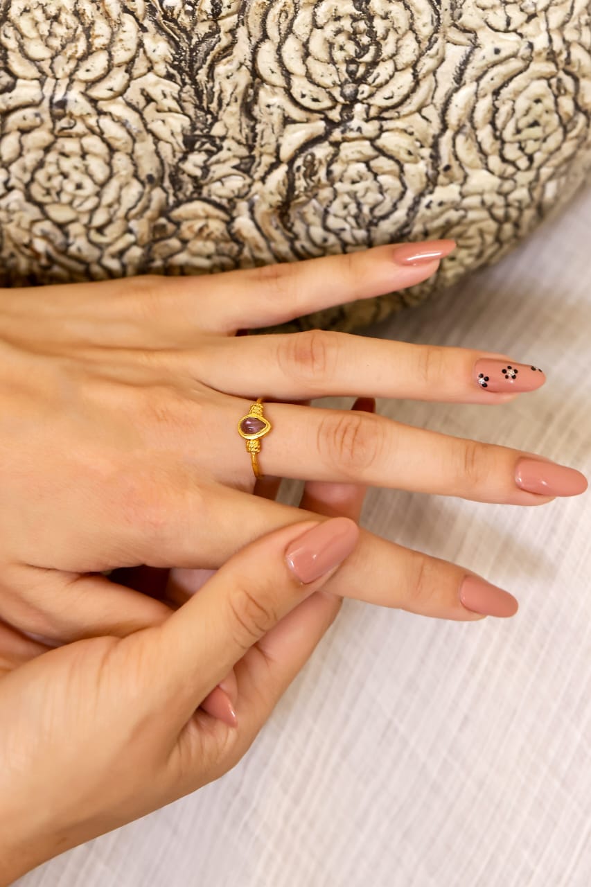 Prachi Ring in 92.5 Sterling Silver, dipped in 1 micron Gold plated with
Semi precious Amythest Ring,
Size made to order.