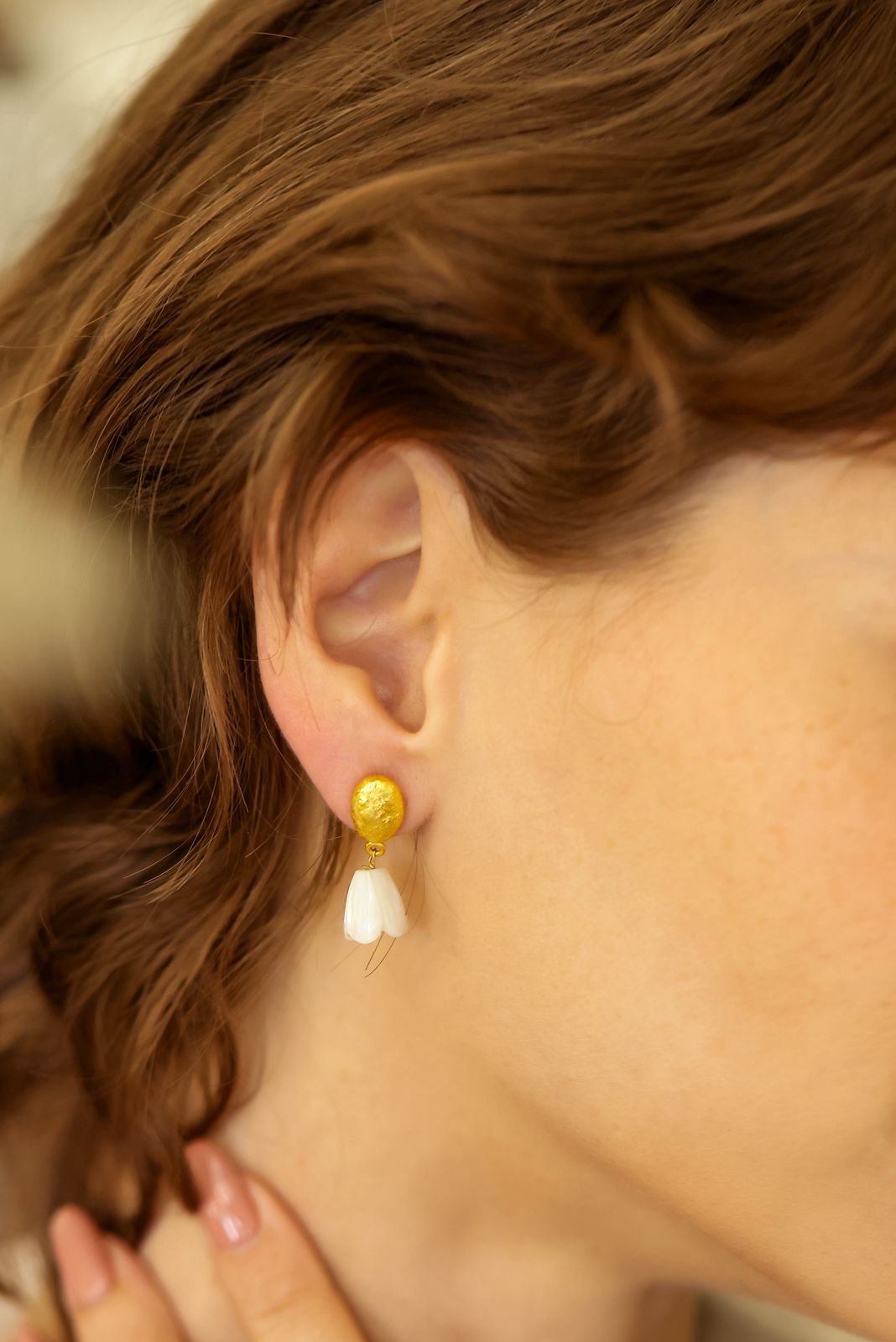 Chandni Jhumki in 92.5 Sterling Silver, dipped in 1 micron Gold plating, with tiny mother of Pearls in a texture.