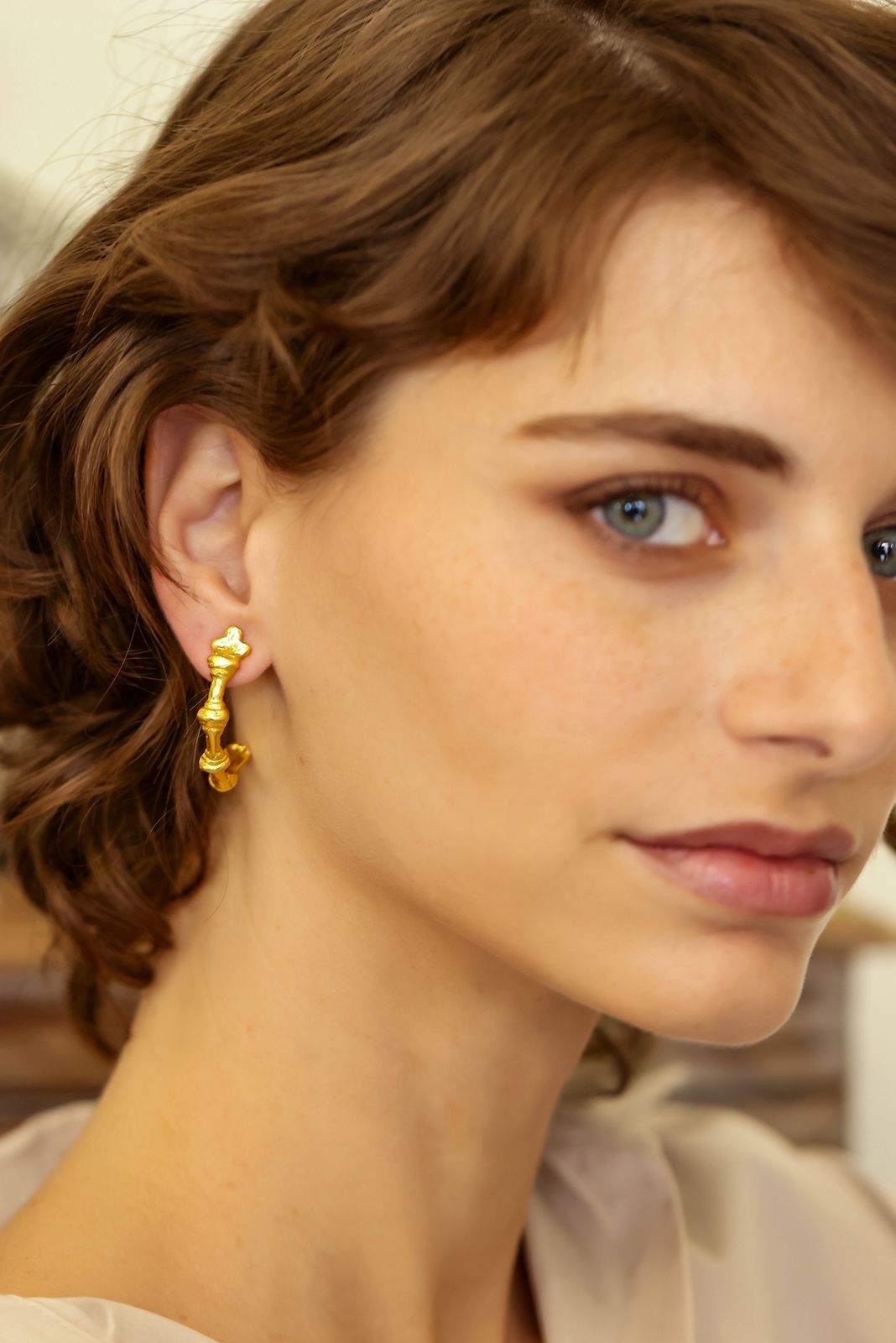 Zeeba Bali in 92.5 Sterling Silver hoops with 18 k gold plating, Textured earrings with Pot-Push mechanism.
