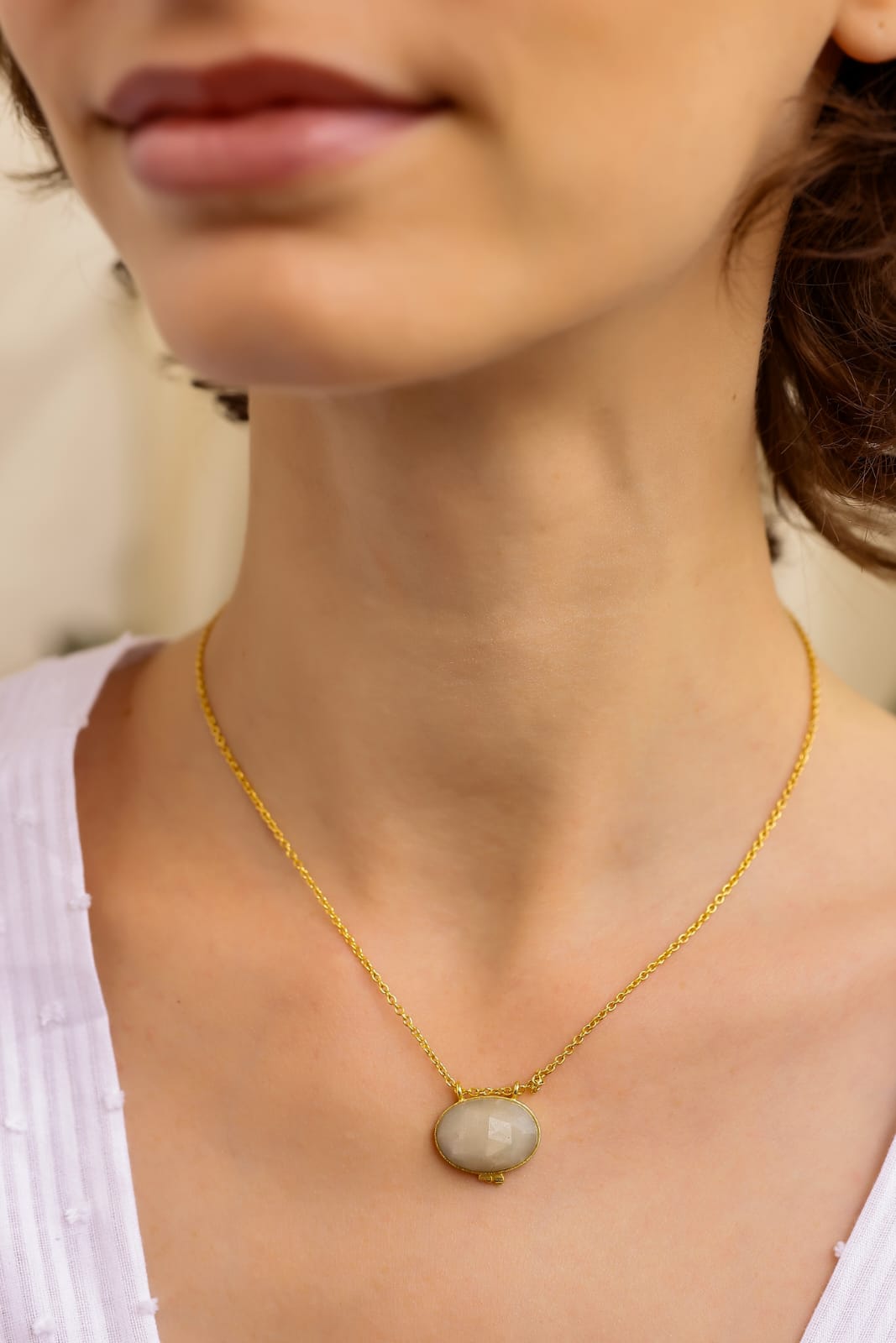 Moonstones necklace with Faceted moonstone set in 92.5 Sterling Silver, dipped in 1 micron Gold plating in 18 karat Gold.