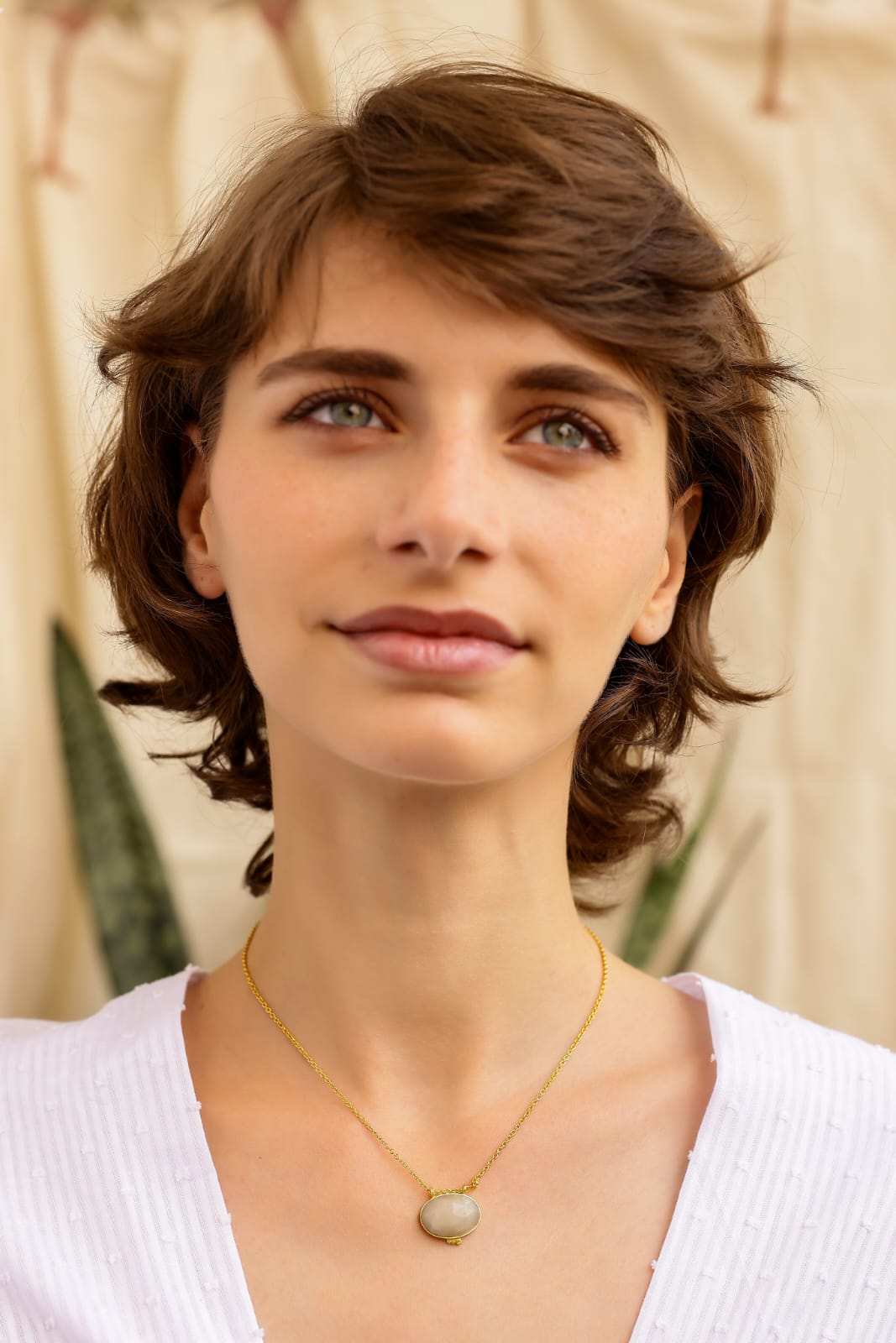 Moonstones necklace with Faceted moonstone set in 92.5 Sterling Silver, dipped in 1 micron Gold plating in 18 karat Gold.