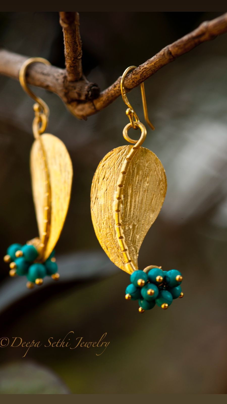 Handcrafted Sterling Silver earrings with Textured leaf in Turquoise bears,
Basant earrings.