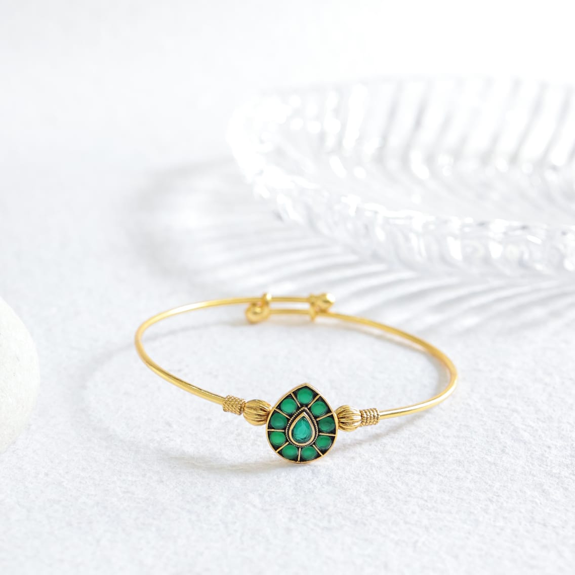 Juhi bracelet in 92.5 Sterling Silver dipped in 1 micron Gold plating with green Onyx Jadau bracelet.