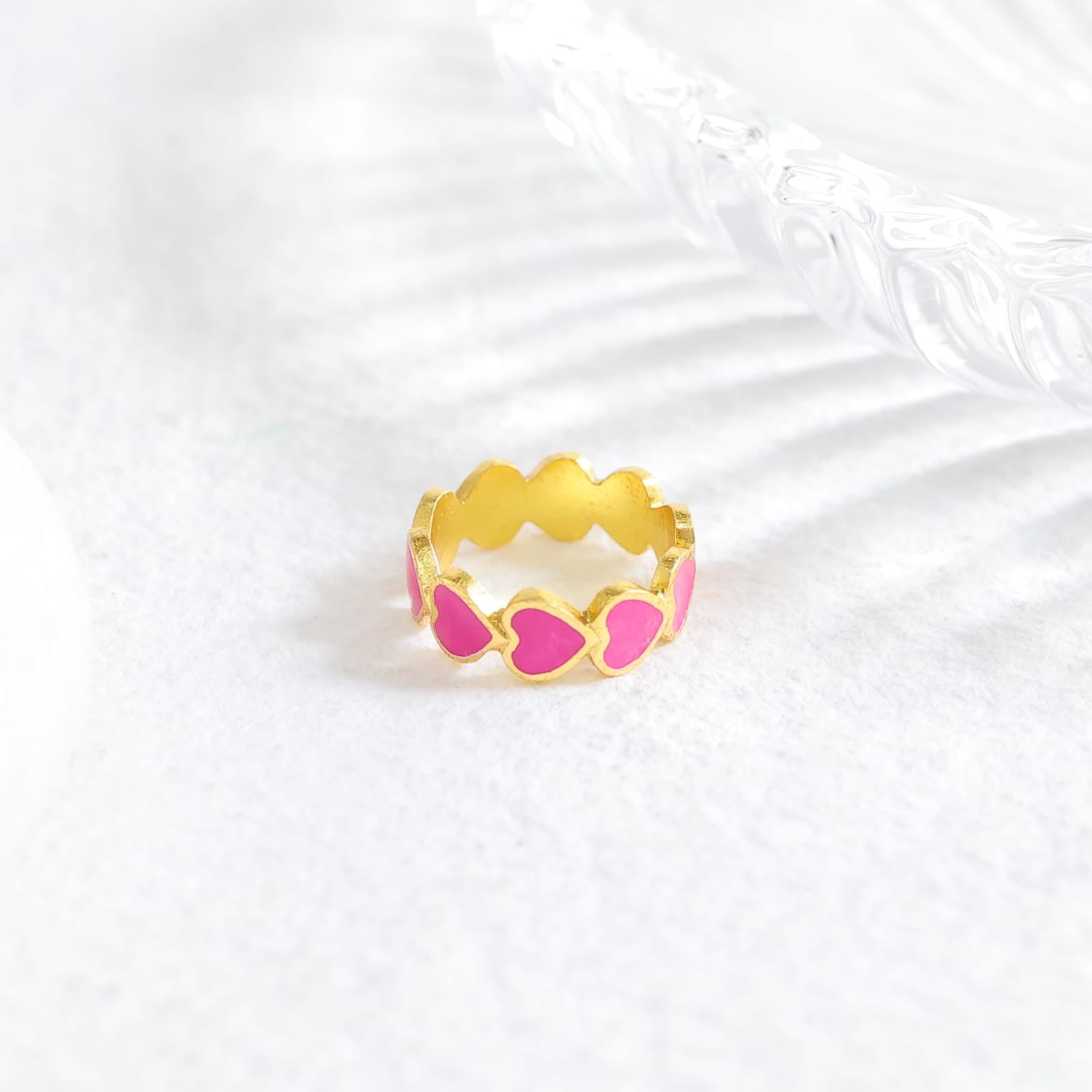 Ishq ring with Fuschia Enamel in 92.5 Sterling Silver dipped in 1 micron Gold plating.