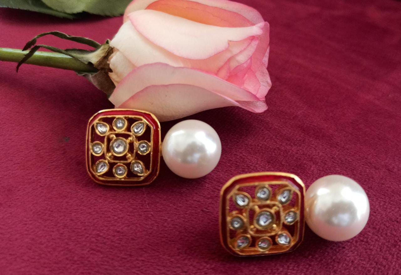 Leela studs in 92.5 Sterling silver handcrafted gold plated jadau polki pearl earrings with red enamel.