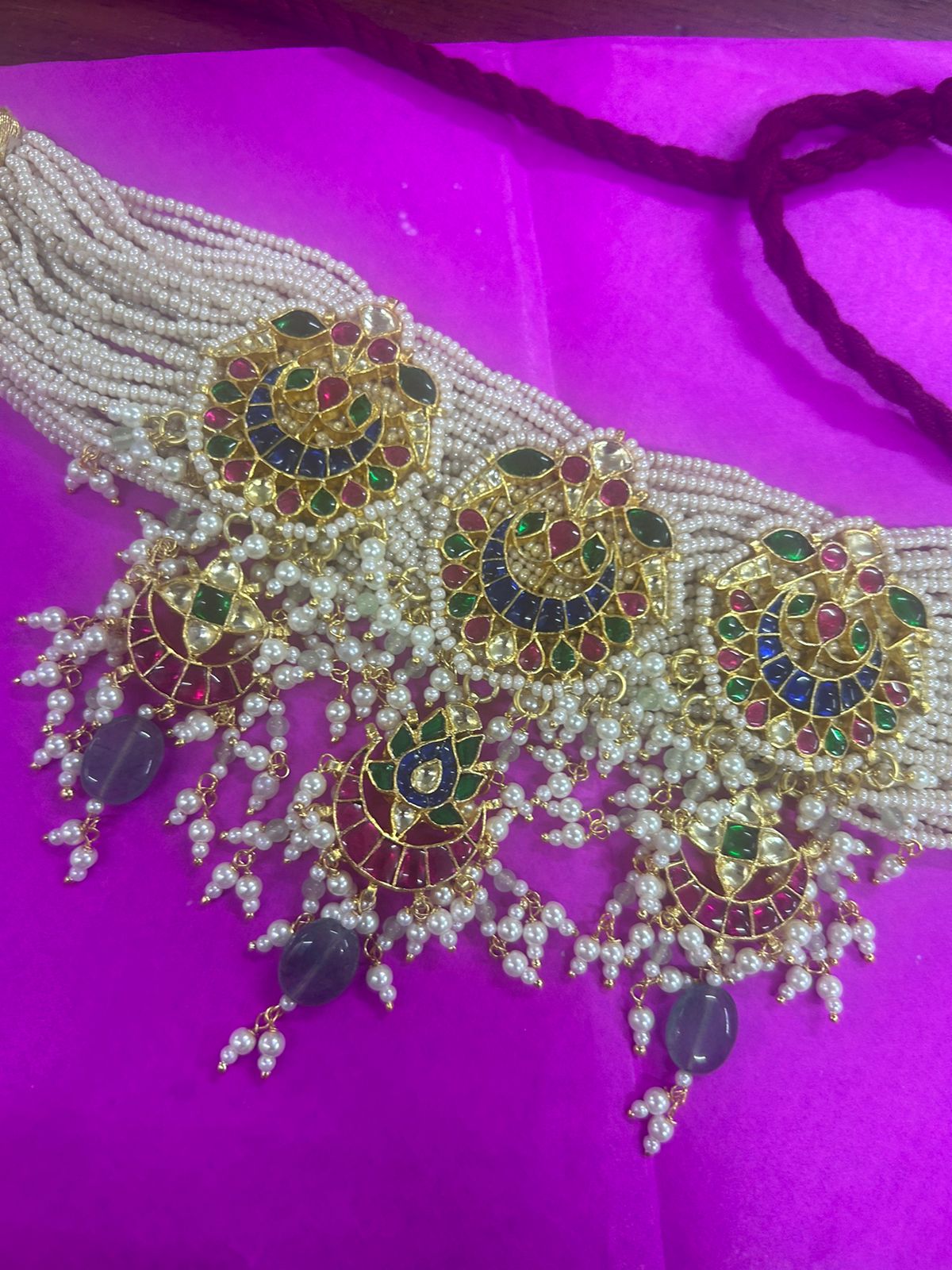 Jodha Necklace in 92.5 Sterling Silver handcrafted and dipped in 1 micron Gold plating necklace in traditional Polki and Pearls.