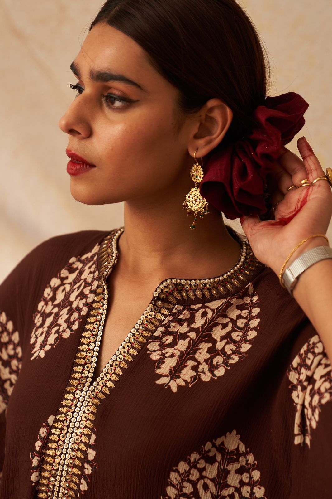 Dilbar earrings in 92.5 Sterling Silver with jadau red Jadau stones in traditional motifs.