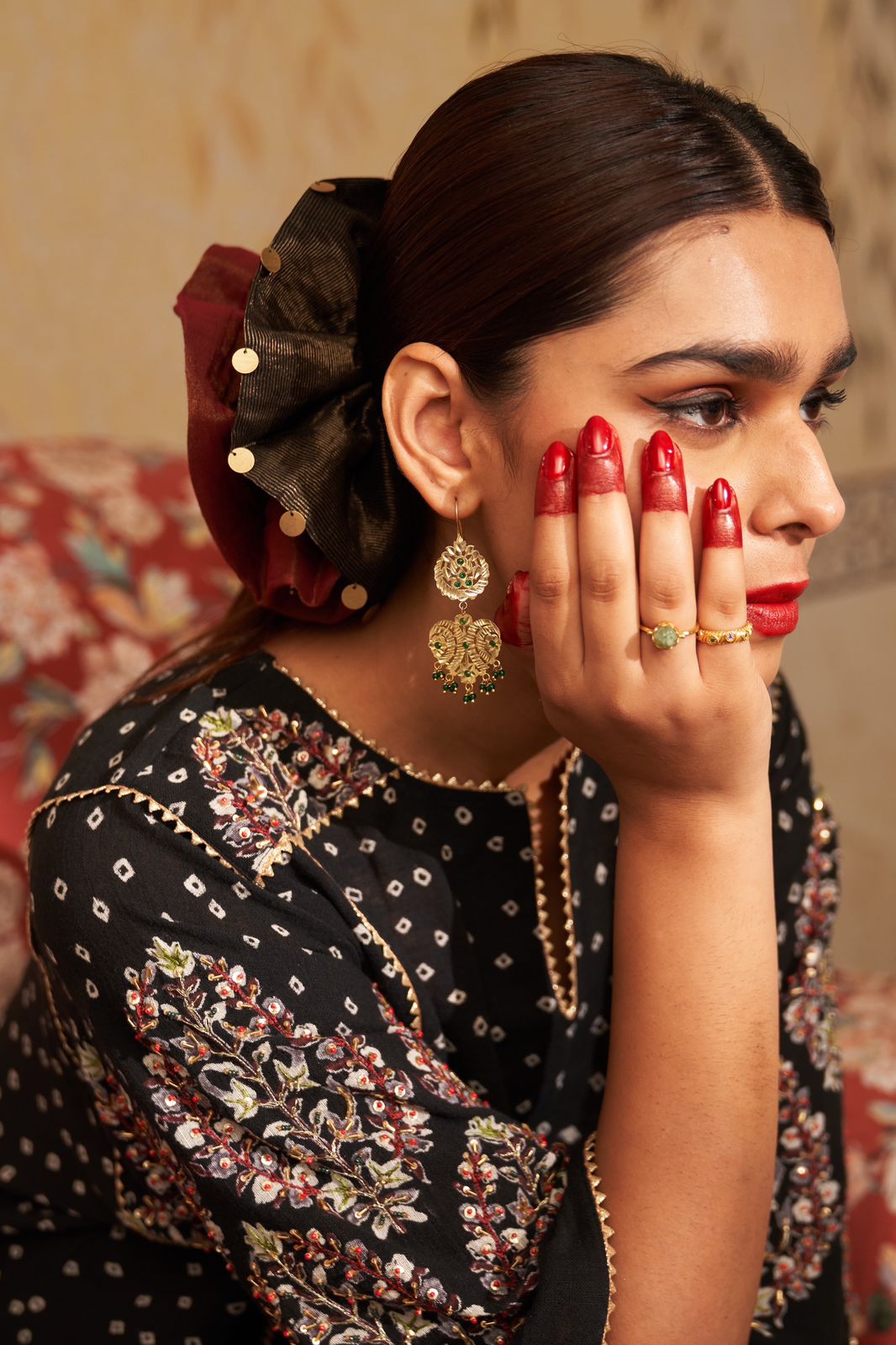Dilbar earrings in 92.5 Sterling Silver with jadau red Jadau stones in traditional motifs.