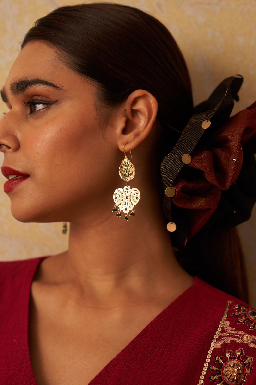 Dilbar earrings in 92.5 Sterling Silver with jadau red Jadau stones in traditional motifs.