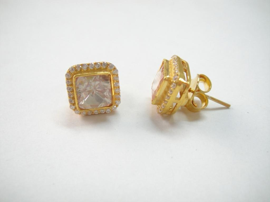 Naghma studs/earrings in 92.5 Sterling Silver handcrafted and dipped in 1 micron Gold plating with Jadau Moissanite Poli Zirconia earrings.