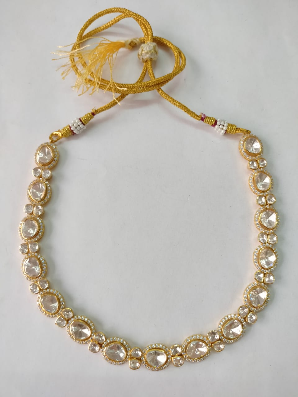 Mahima necklace in 92.5 Sterling Silver handcrafted and dipped in 1 micron Gold plating with Jadau and traditional Moissanite Polki in Zirconia.