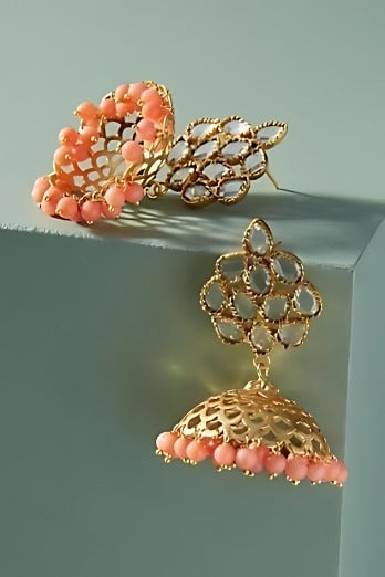 Nawajish earrings in 92.5
Sterling Silver handcrafted and dipped in 1 micron Gold plating, light weight Jhumka with coral beads.