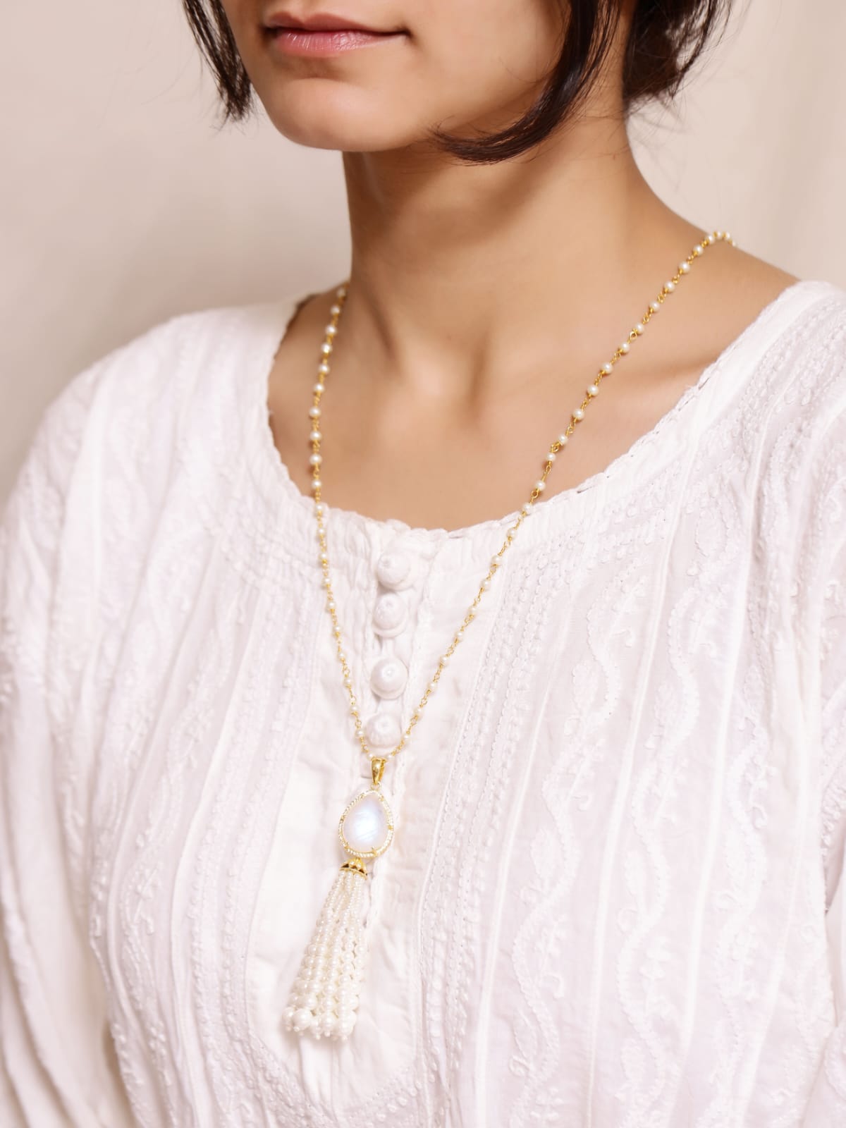 Moonstone Tassel necklace in 92.5
Sterling Silver with faceted Moonstones and Pearls with cz.