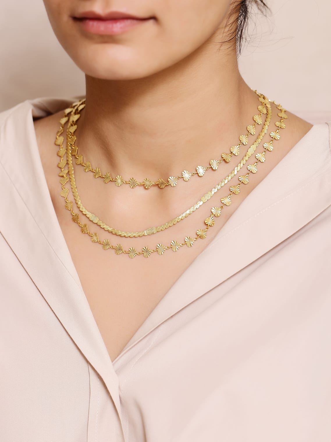 Stacking Manikaran chain in handcrafted alloy and dipped in 1 micron Gold plating.