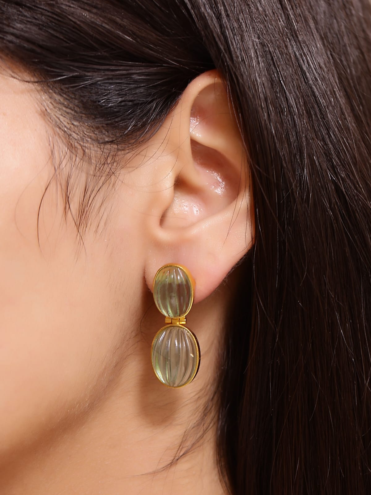 Lehar earrings in 92.5 Sterling Silver handcrafted and dipped in 1 micron Gold plating with carved Fluorite.