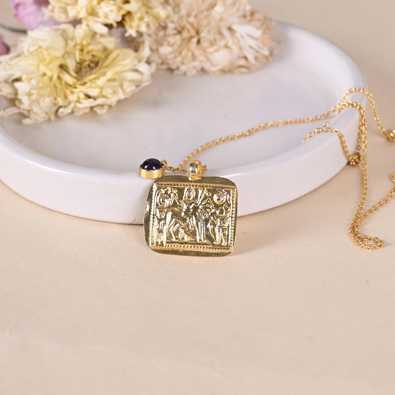 Katayani pendant handcrafted in 92.5 Sterling Silver, dipped in 1 micron Gold plating in an antique embossed finish.