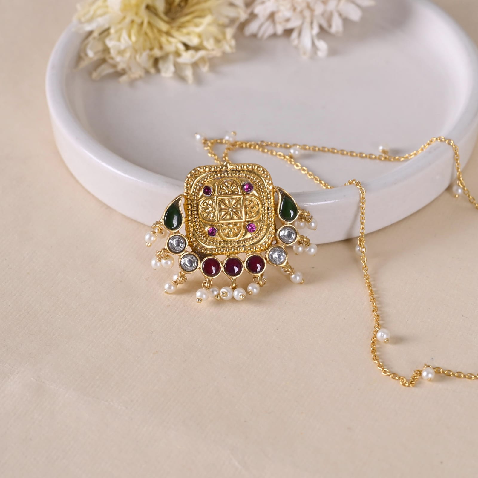 Mantra pendant in 92.5 Sterling Silver handcrafted and dipped in 1 micron Gold plating with embossed finish with Jadau-Polki.