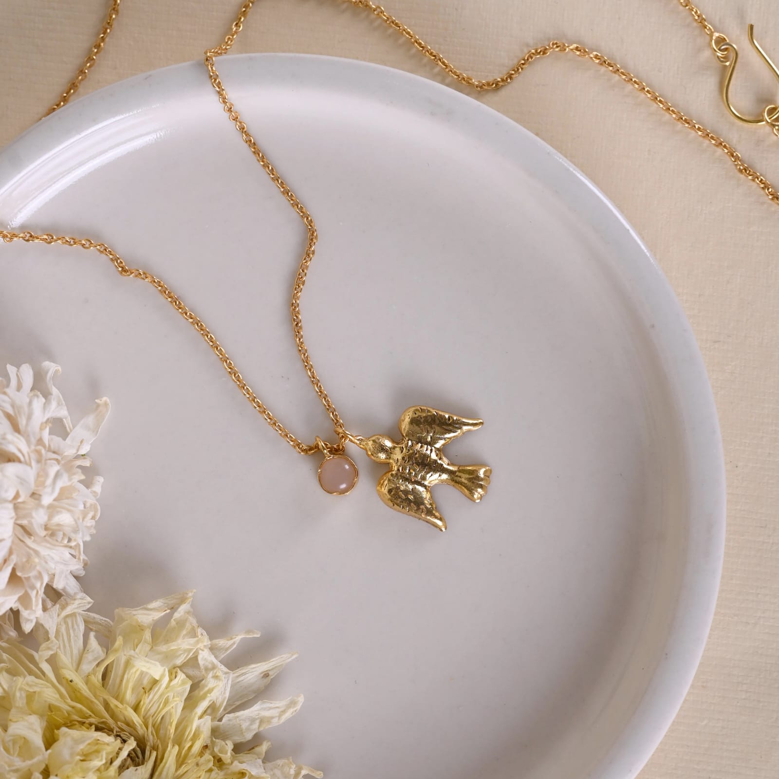 Panchi pendant in 92.5 Sterling Silver handcrafted in 1 micron Gold plating with Rose-Quartz.