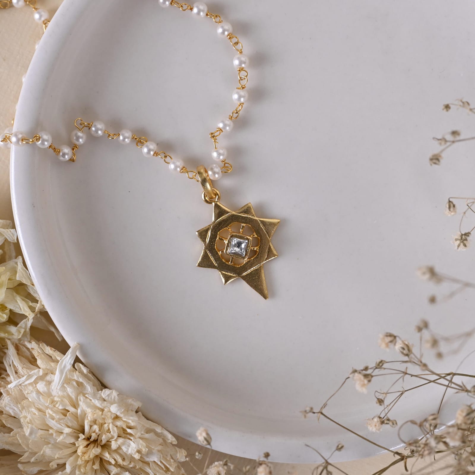 Jayanti pendant handcrafted in Sterling Silver dipped in micron Gold  plating in antique