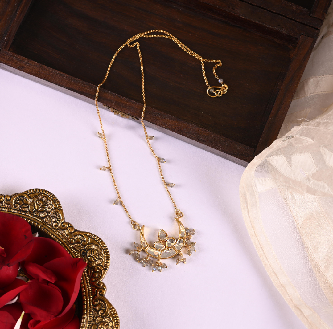 Chaanda necklace in 92.5 Sterling Silver handcrafted and dipped in 1 micron Gold plating with Jadau-Polki in antique finish.