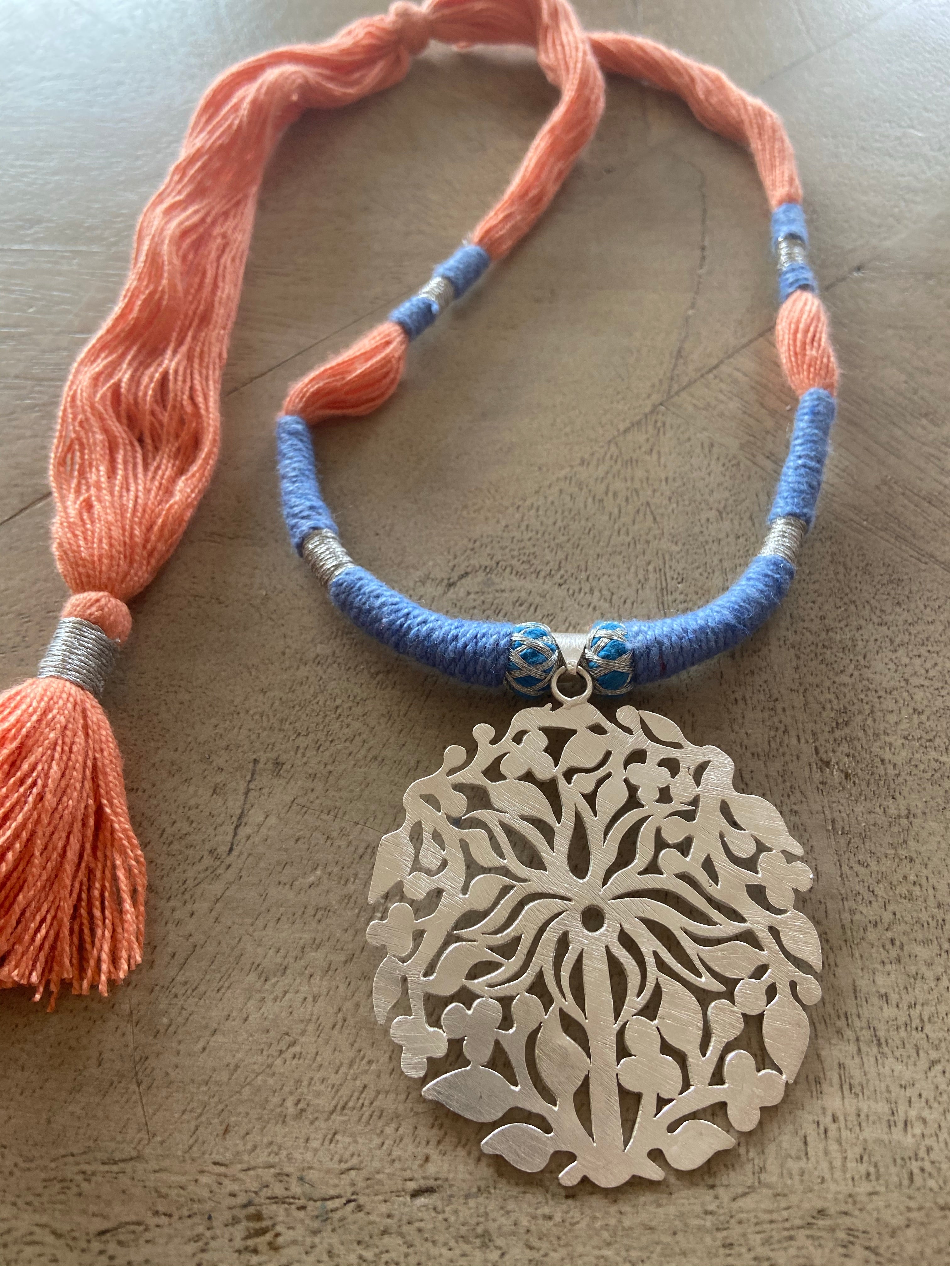 Silver pendent palm tree with thread work