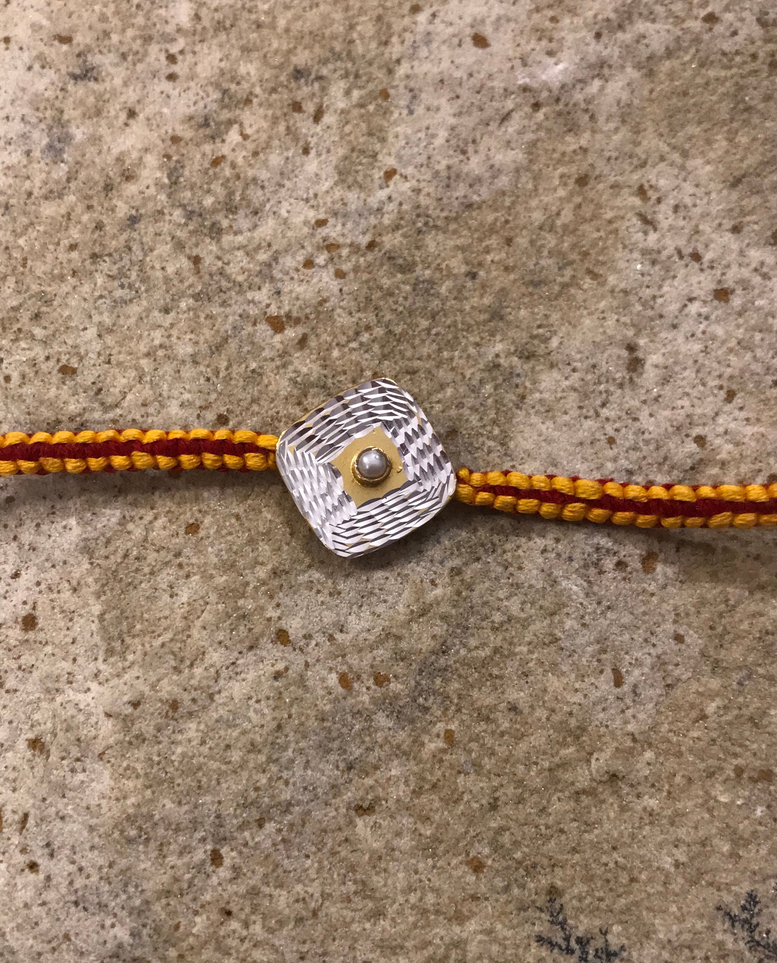 Rakhi silver with texturing