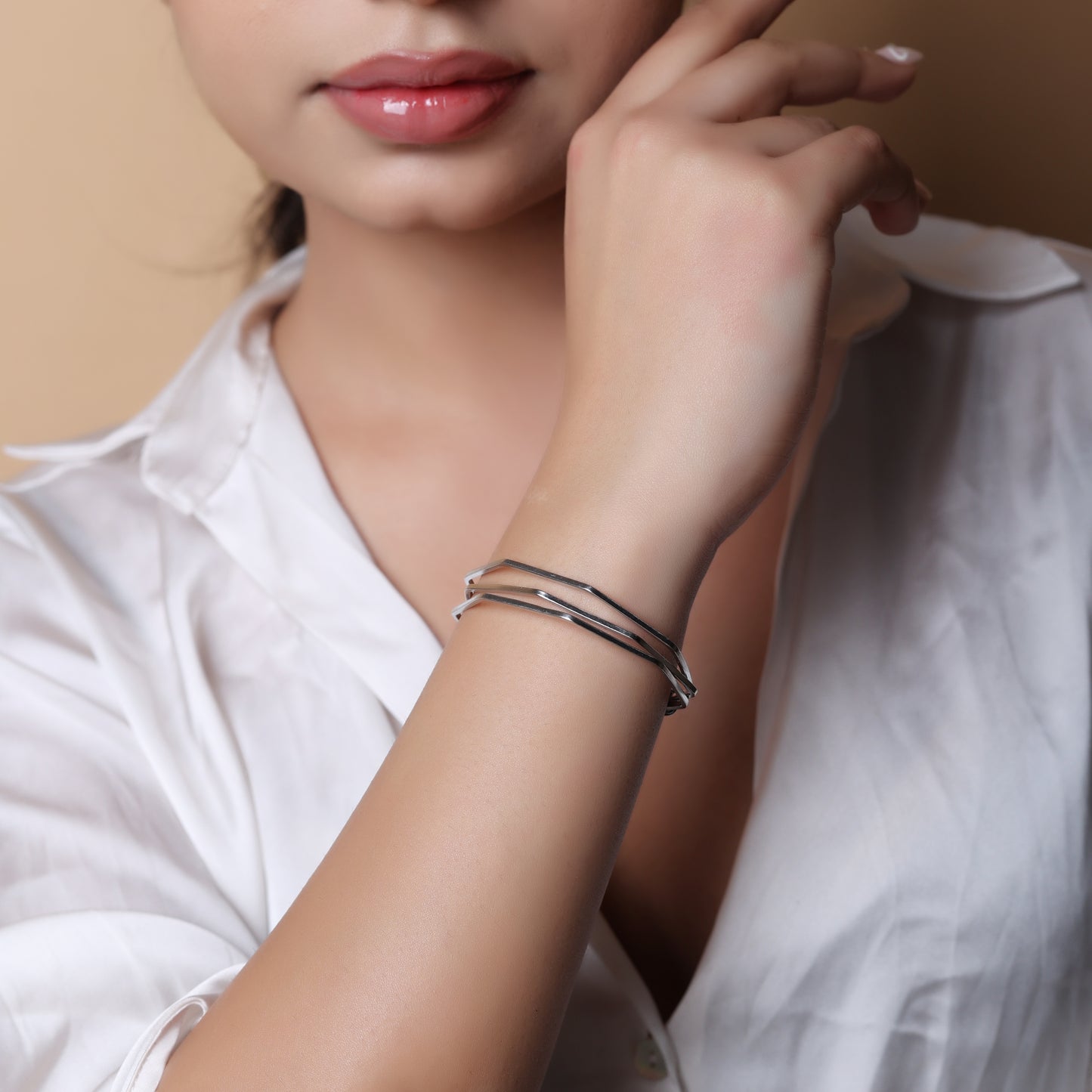 Sterling Silver Stacking bracelet in a geometric shape, adjustable.