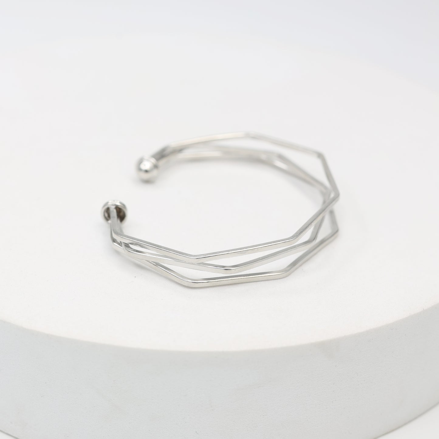 Sterling Silver Stacking bracelet in a geometric shape, adjustable.