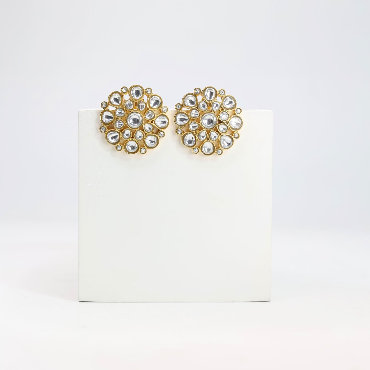 Sterling Silver oversized stud earrings with billor Polki in Post-Push closure.