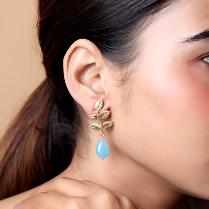 Sterling Silver Gold plated
Texture leaf with aqua Calcy drop
Indo Western look.