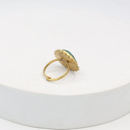 Carved green Onyx ring set in sterling Silver with 1 micron Gold plating.
Handcrafted with love, adjustable.