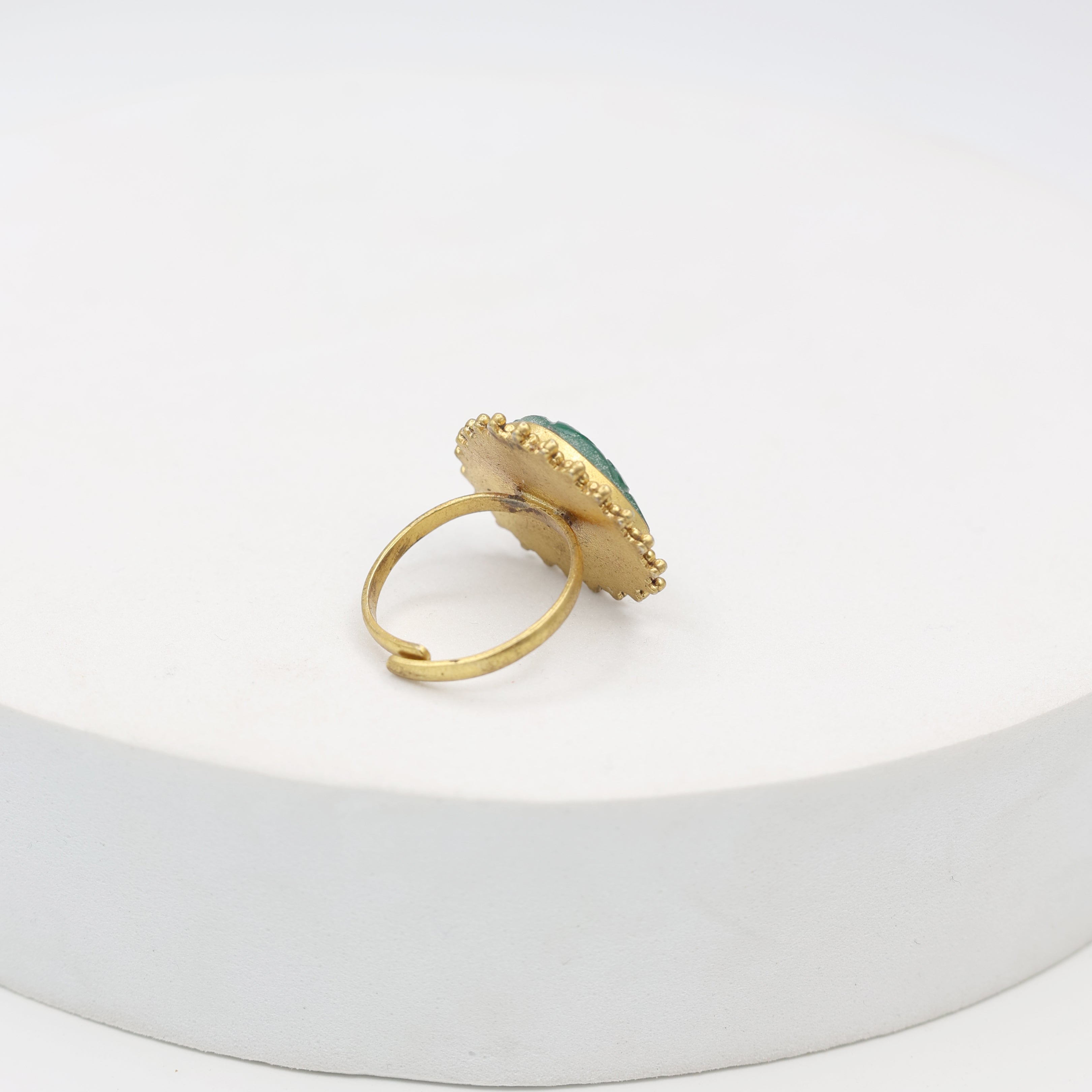 Carved green Onyx ring set in sterling Silver with 1 micron Gold plating.
Handcrafted with love, adjustable.