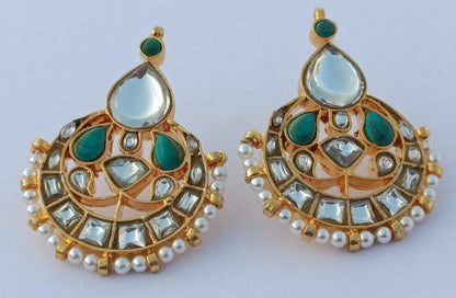 Turquoise chand bali 

Sterling silver Chand Bali with billor Polki turquoise and fresh water pearls 
