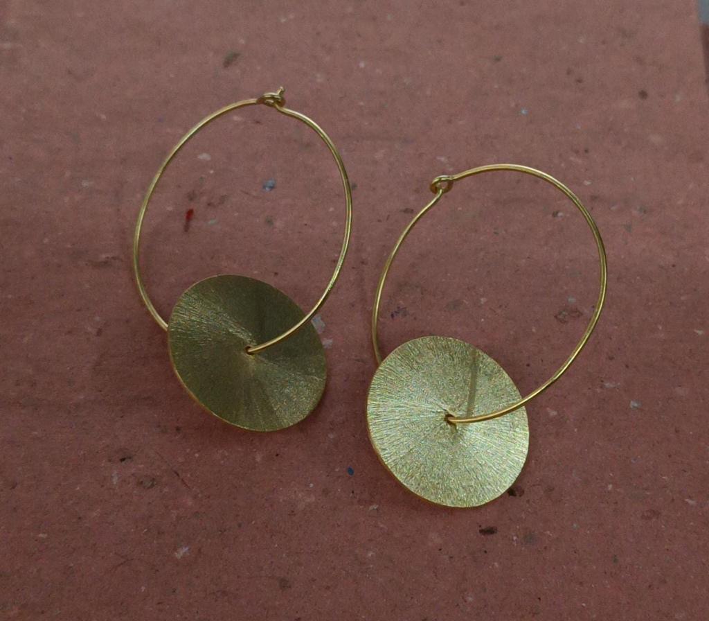 Silver gold plated disc earrings 
Hammered discs