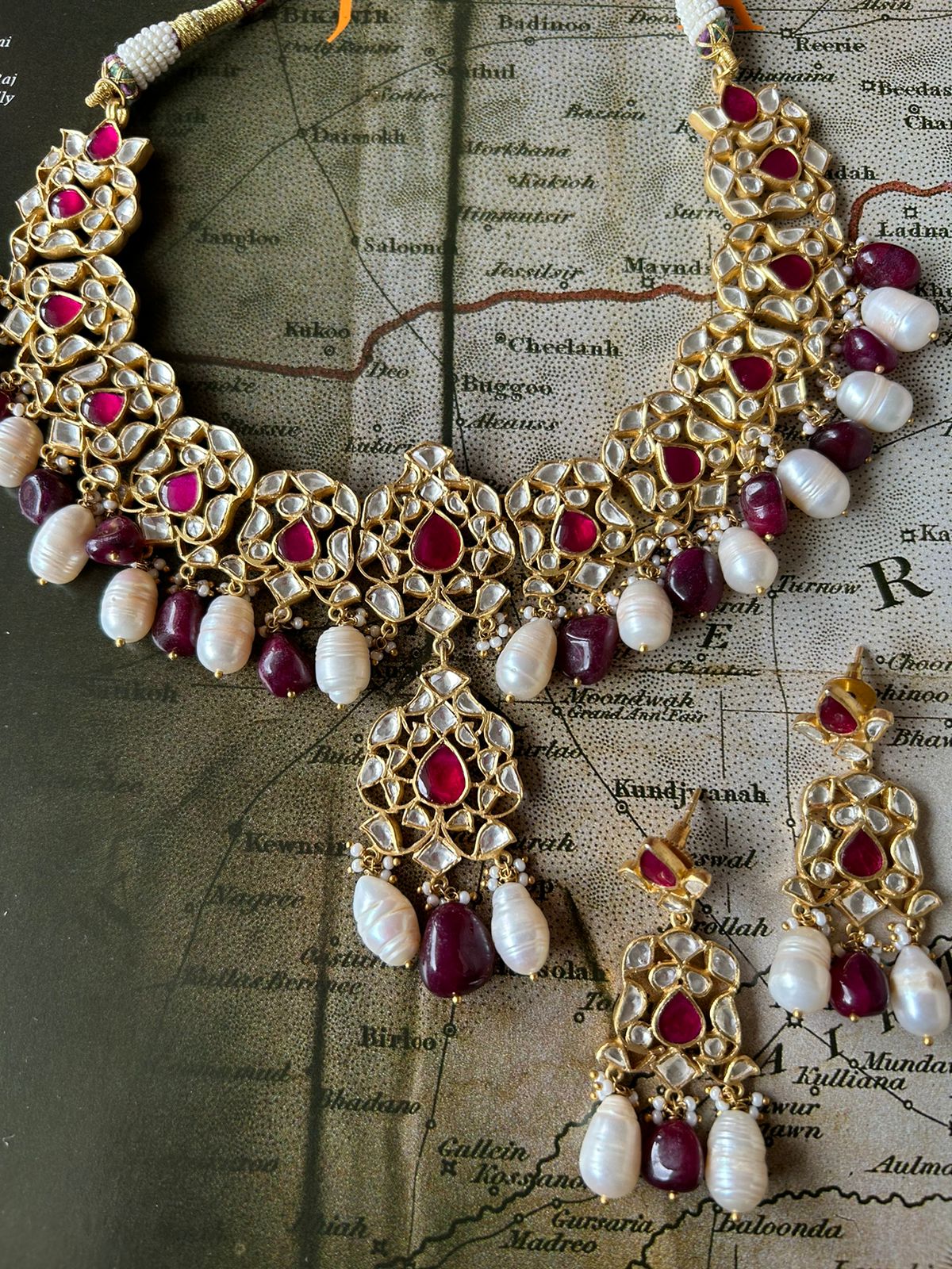 Jadau choker with earrings 
Sterling silver With billor Polki and pearls