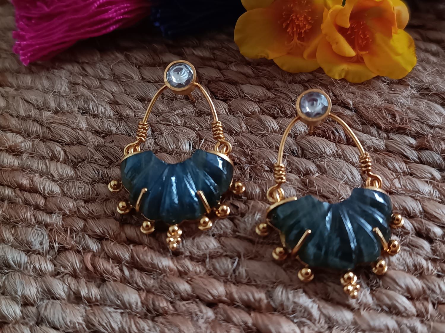 Labradorite carved stone hoops with crystal.
Sterling silver with 1 micron gold plating.