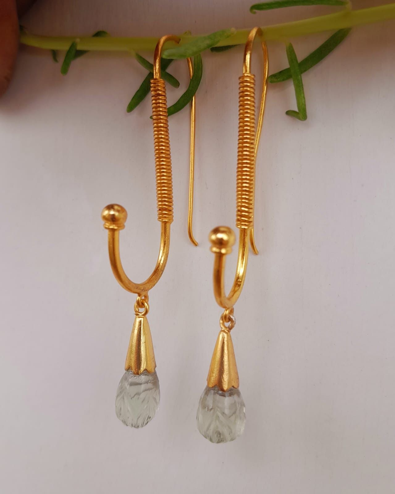 Handcrafted silver,

1 micron gold plating hook earrings,

Carved green amethyst.