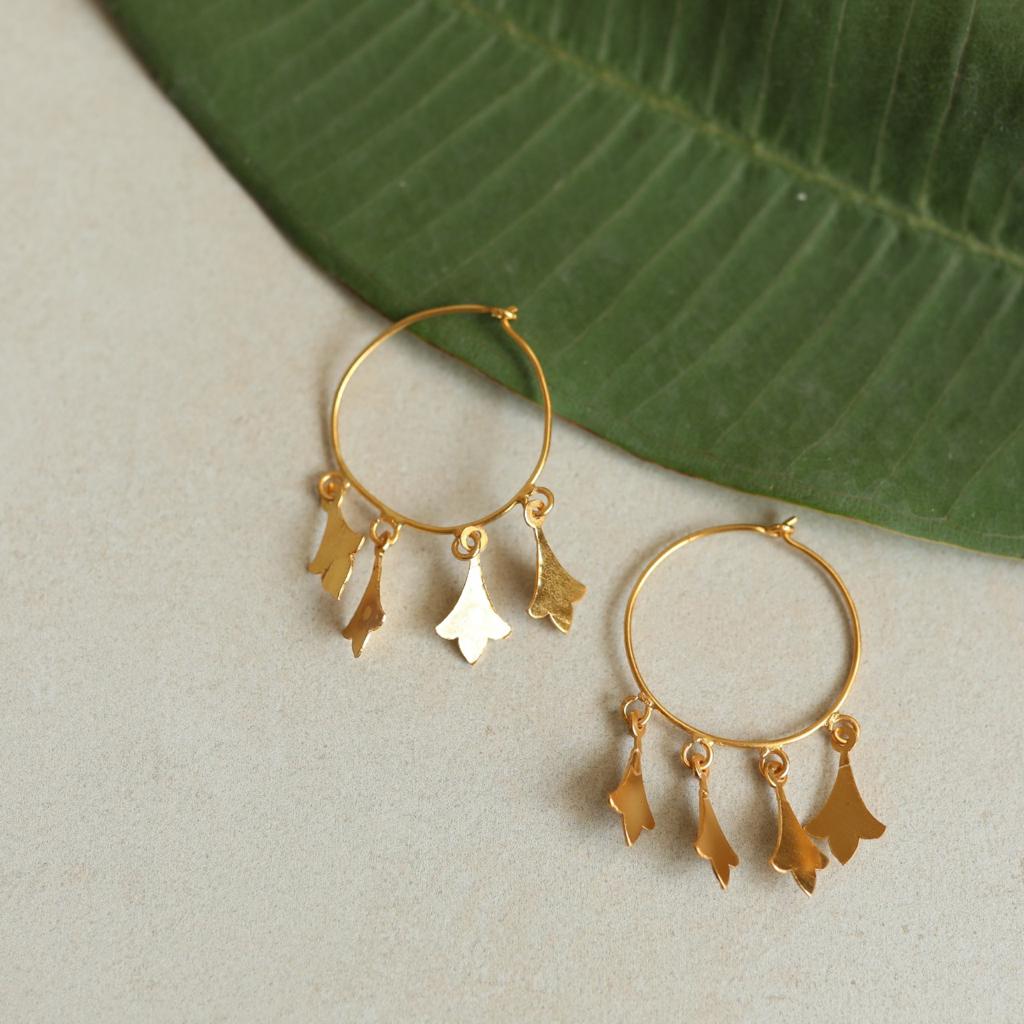 Sterling silver hoops with 1 micron gold plating.