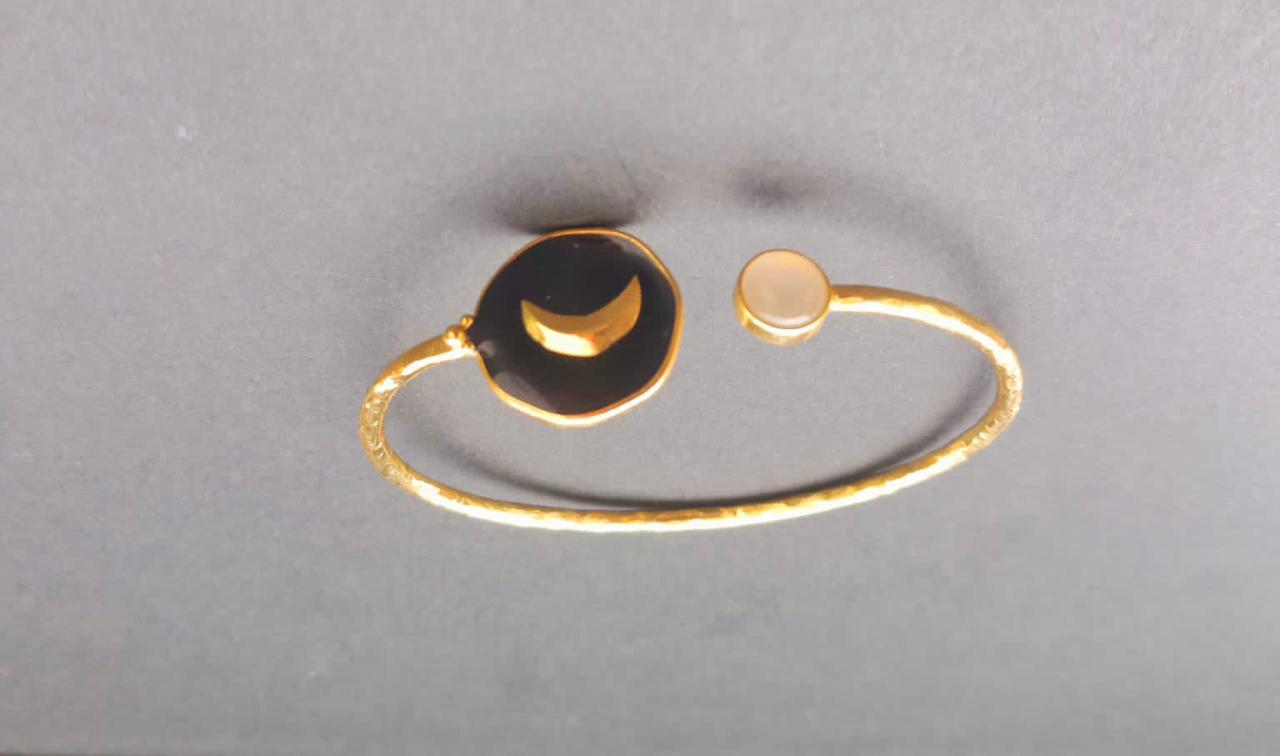 Sterling silver adjustable, Crescent bracelet with 24 karat gold plating, Rose quart and enamelling.