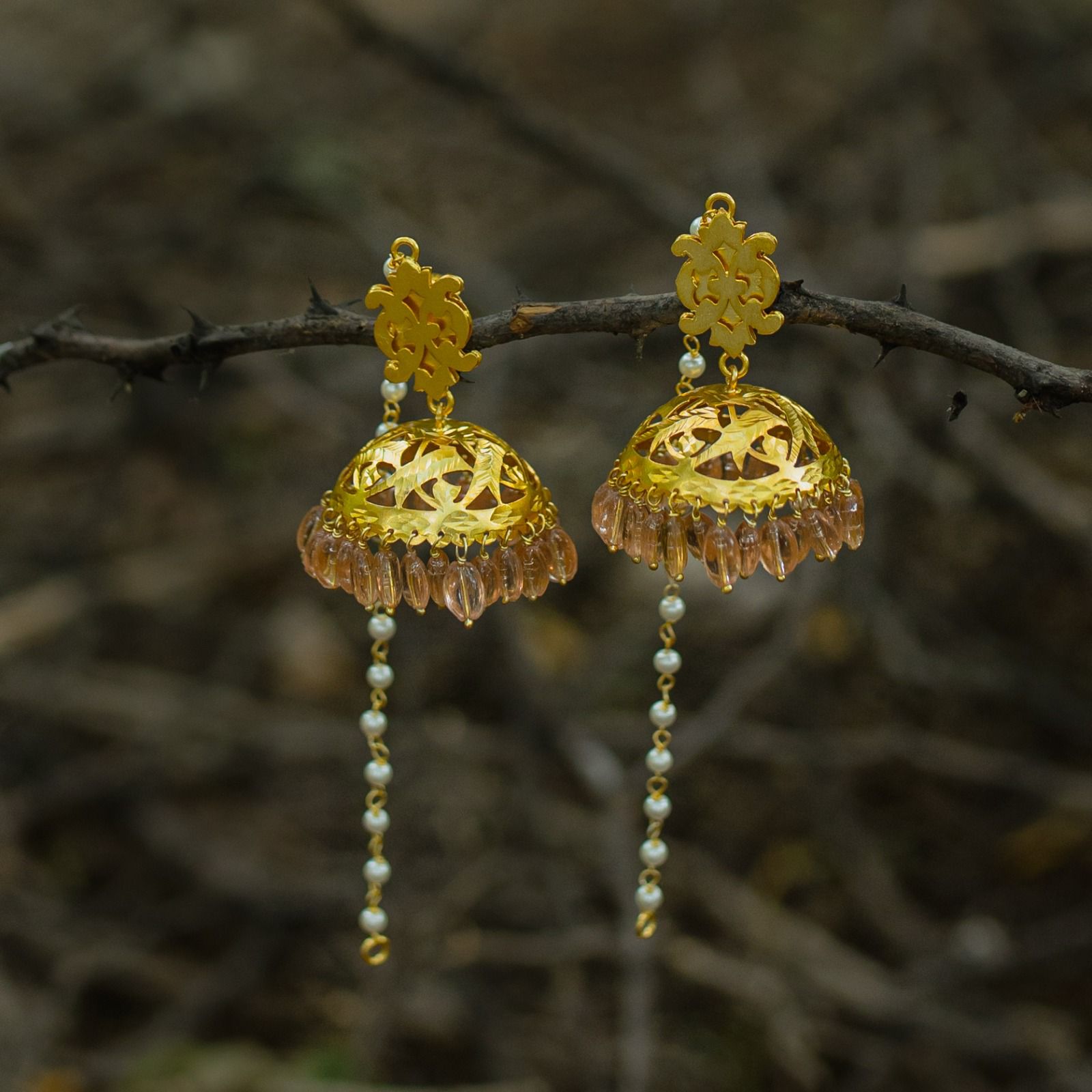 Jhumka with kanchain 
Sterling silver with 18 k gold plating 
Carnelian drops with pearls in the kanchain.