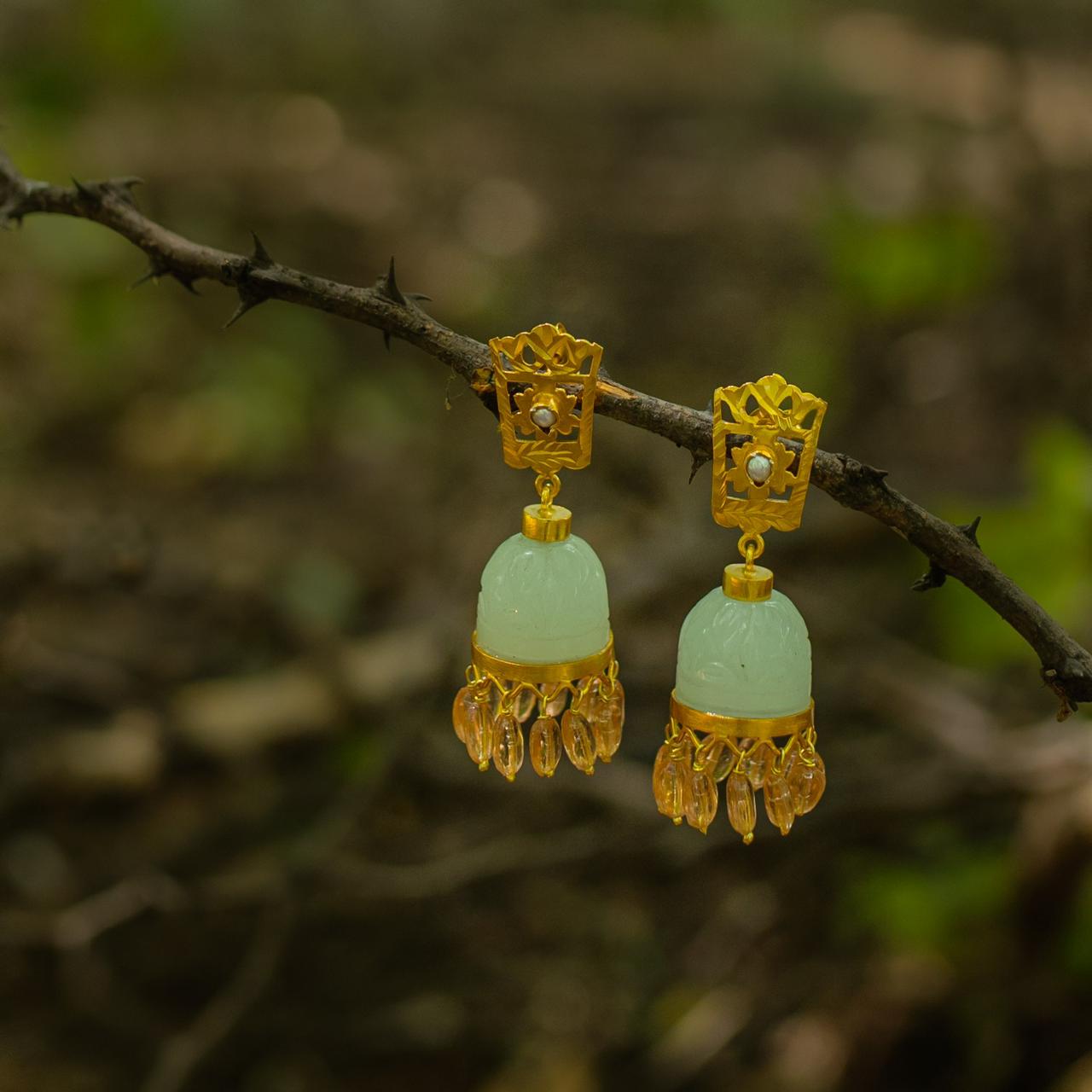 Grapes aventurine stone  jhumka with carving, flower top with post. Sterling silver with 24 karat gold plating, 
Carnelian drops.