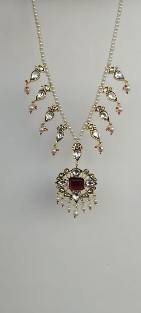 Lal paan necklace                 1 micron gold plated Necklace with Pearls and Jadau Polki stones.