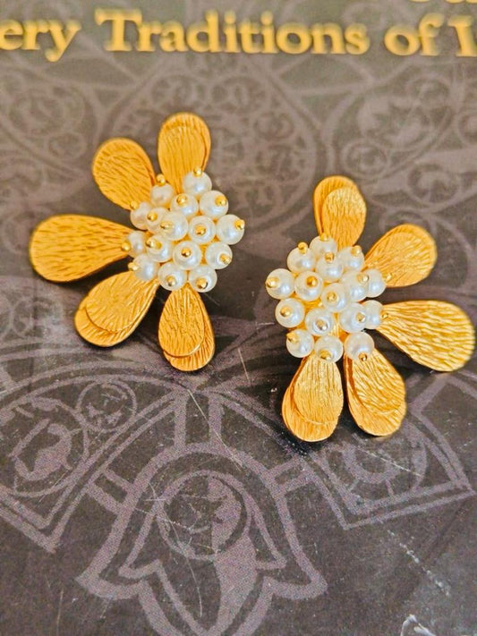 Sterling silver flower earrings with hammering Fresh water Pearls and 1 micron gold plating.